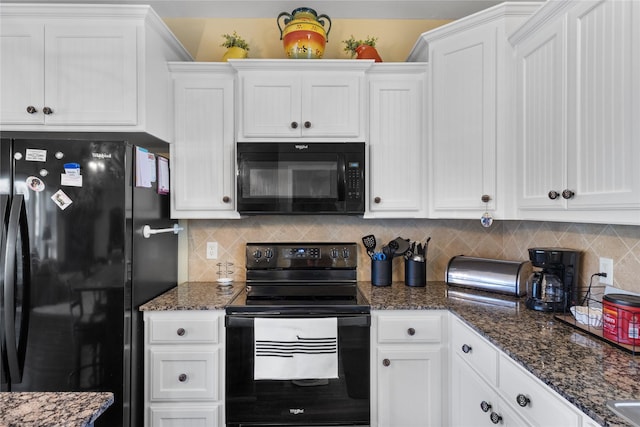 kitchen featuring white cabinetry, black appliances, dark stone countertops, and decorative backsplash