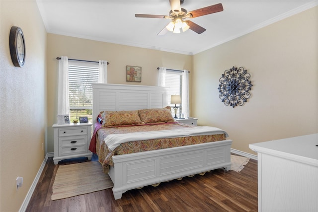 bedroom featuring ornamental molding, a ceiling fan, baseboards, and dark wood-style flooring