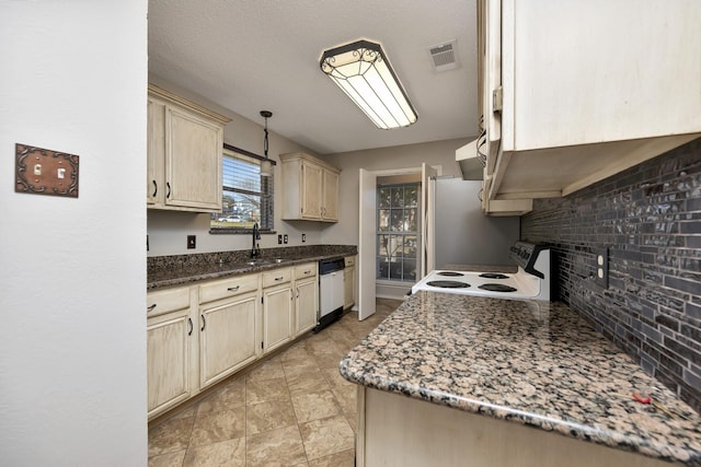 kitchen with visible vents, cream cabinetry, tasteful backsplash, ventilation hood, and white appliances