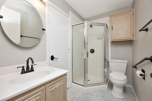 full bath with toilet, a stall shower, vanity, and a textured ceiling