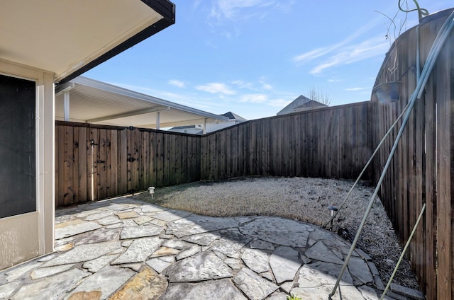 view of patio with a fenced backyard