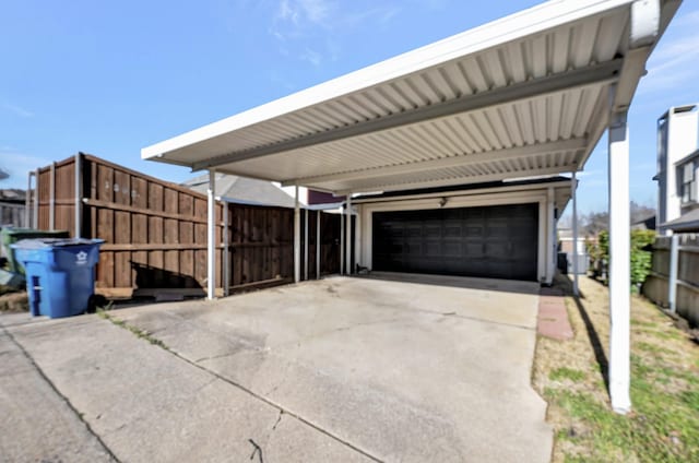 garage featuring fence