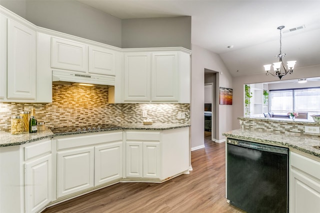 kitchen with light wood-style flooring, decorative backsplash, black appliances, white cabinets, and under cabinet range hood