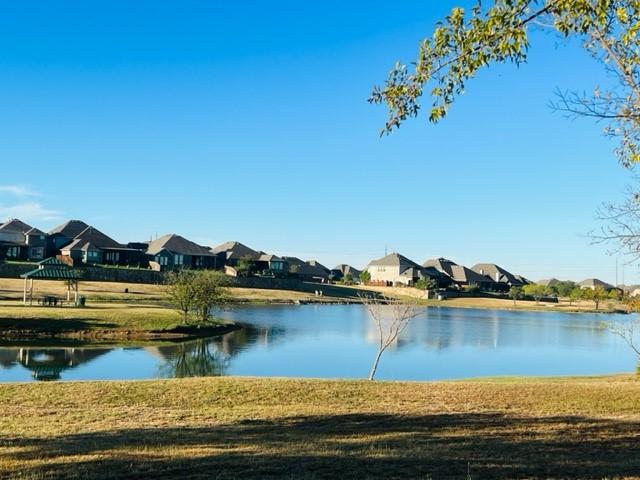 property view of water with a residential view