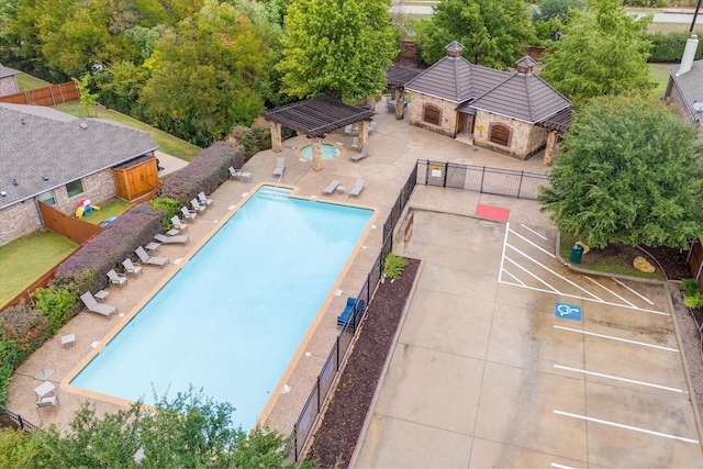 pool with a gazebo, a patio, fence, and a pergola