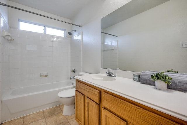 bathroom featuring vanity, toilet, tub / shower combination, and tile patterned flooring