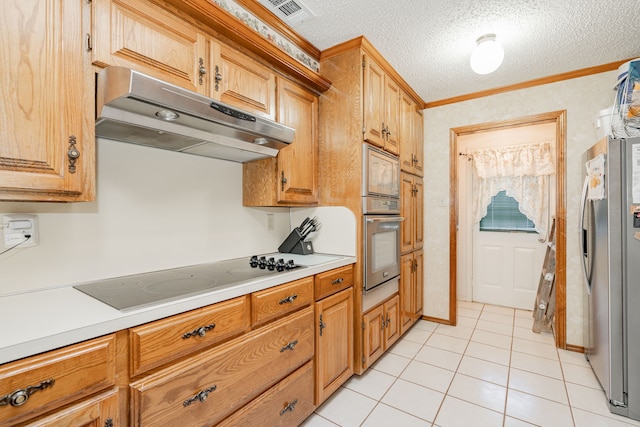 kitchen featuring under cabinet range hood, a textured ceiling, stainless steel appliances, crown molding, and light countertops