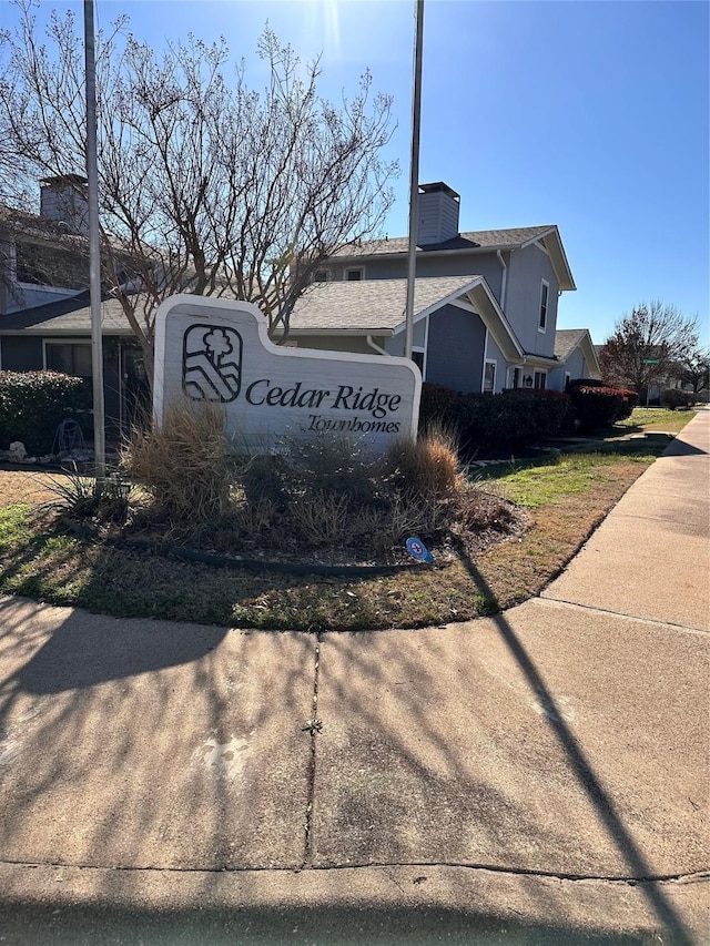 view of community sign