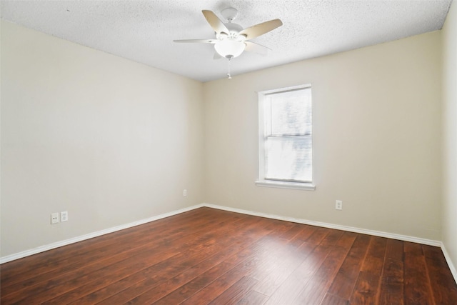 unfurnished room featuring baseboards, a ceiling fan, hardwood / wood-style floors, and a textured ceiling