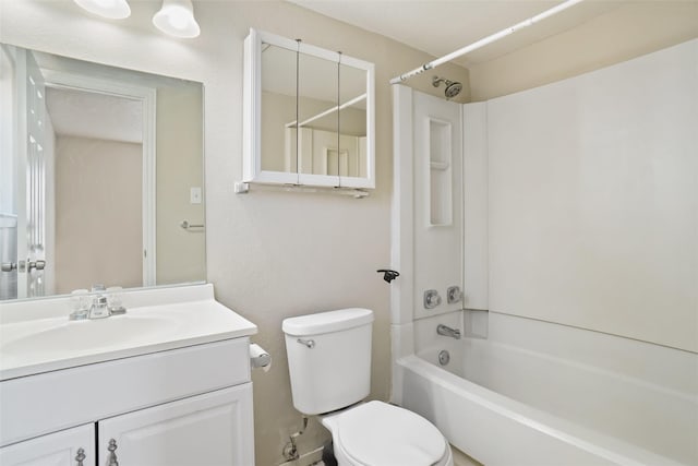 bathroom with shower / bathtub combination, vanity, and toilet