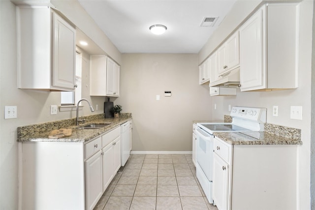 kitchen with baseboards, white appliances, under cabinet range hood, visible vents, and a sink