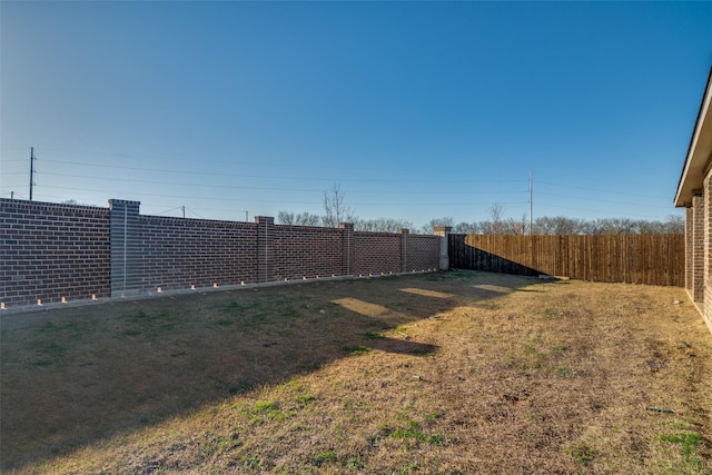 view of yard featuring fence