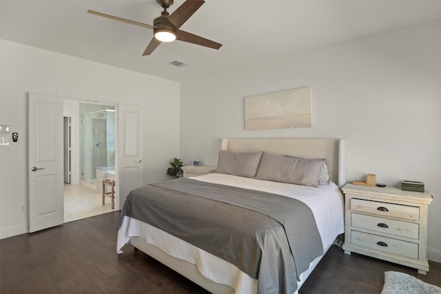 bedroom featuring dark wood-type flooring, a ceiling fan, visible vents, and baseboards