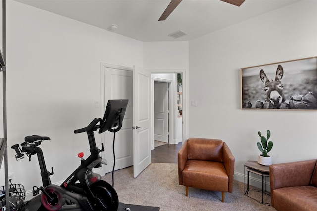 workout room with visible vents, baseboards, carpet, and a ceiling fan