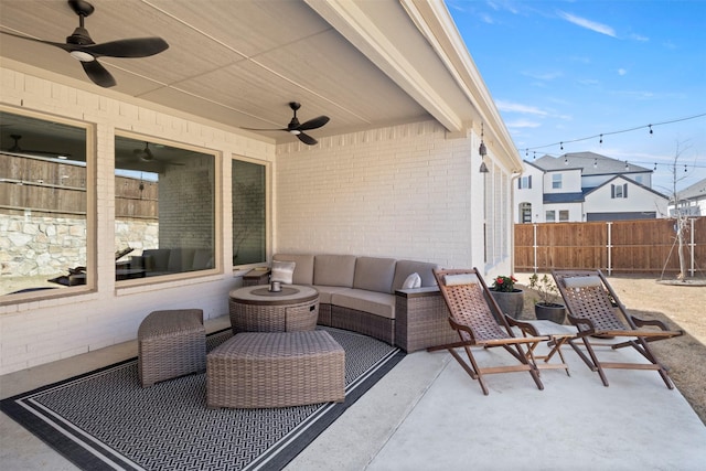 view of patio / terrace with a residential view, an outdoor hangout area, and fence