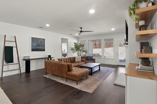 living area featuring recessed lighting, baseboards, dark wood finished floors, and a ceiling fan