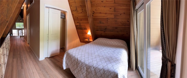 7045 Layman Dr, Eustace, TX 75124 - bedroom featuring wood finished floors and baseboards