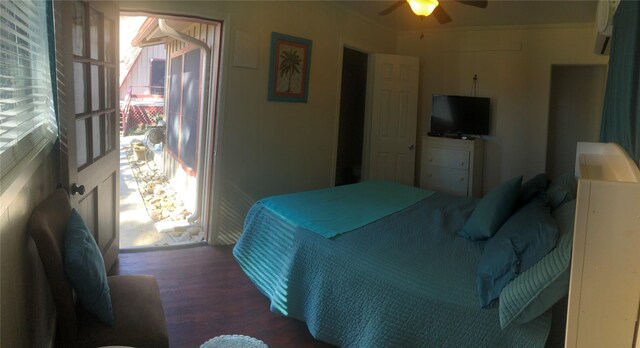 bedroom with ceiling fan and wood finished floors