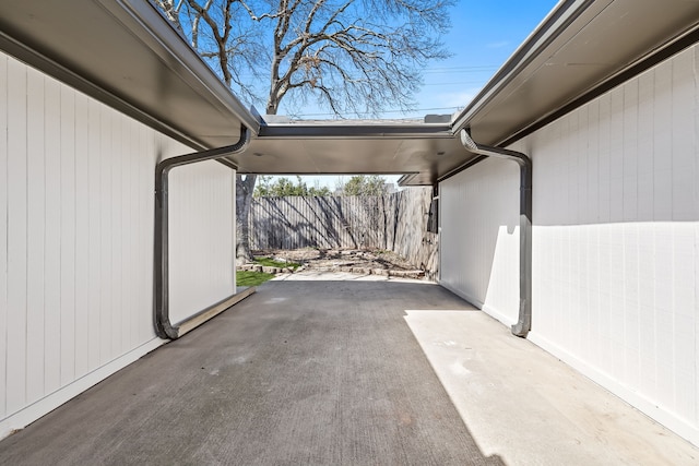 garage featuring fence