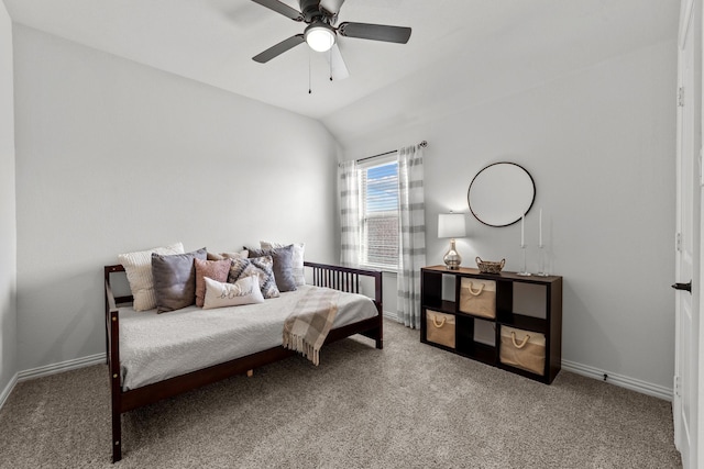 living area featuring baseboards, carpet, and vaulted ceiling