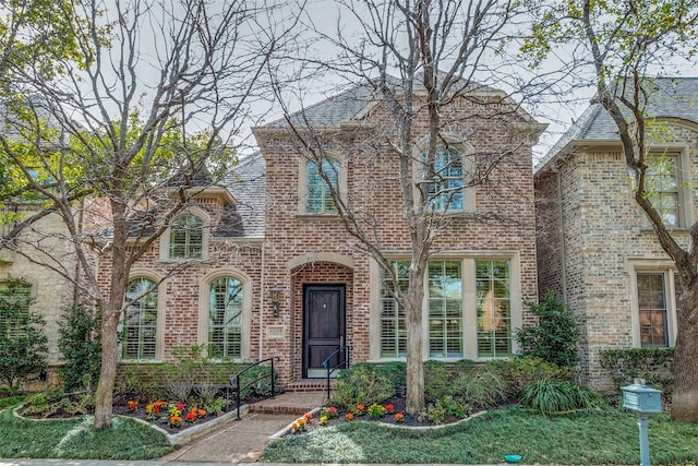 view of front of property with brick siding