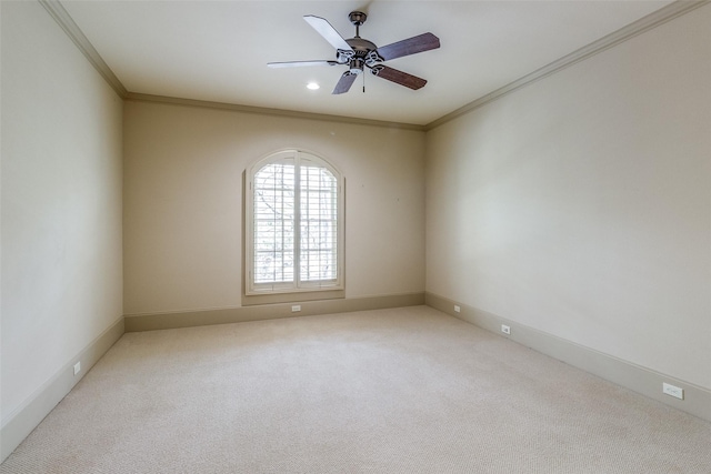 carpeted spare room featuring ceiling fan, baseboards, ornamental molding, and recessed lighting