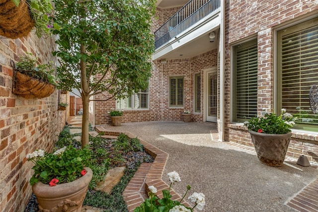 exterior space featuring a patio and fence