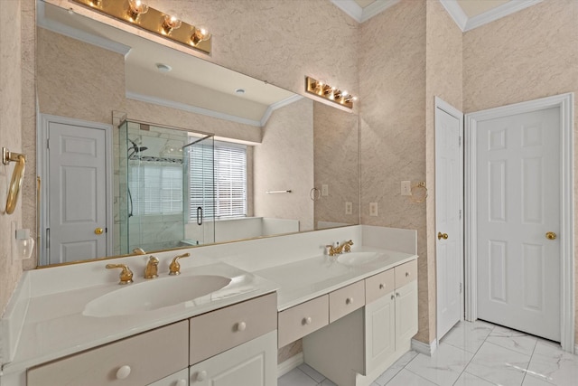 full bathroom featuring a sink, a shower stall, and crown molding