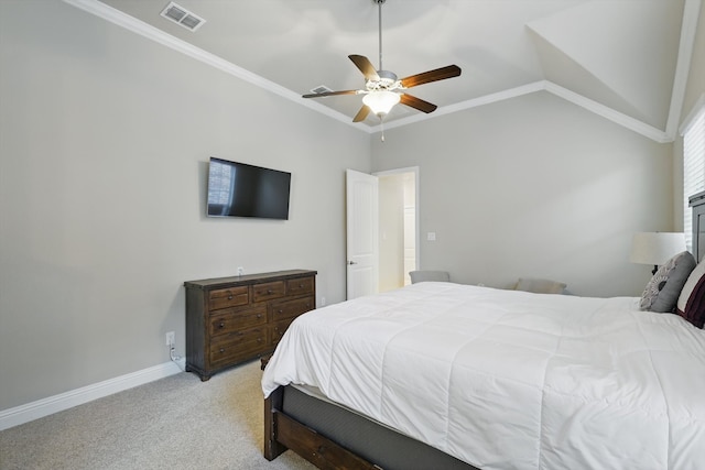 bedroom with visible vents, crown molding, baseboards, light colored carpet, and lofted ceiling