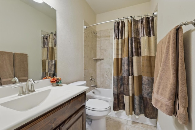 full bathroom with vanity, tile patterned floors, toilet, and shower / bath combo