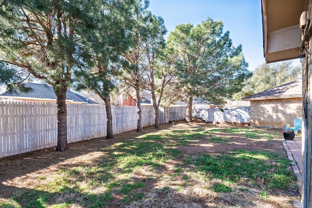 view of yard featuring a fenced backyard