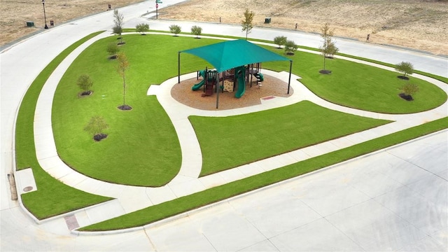 view of property's community featuring playground community