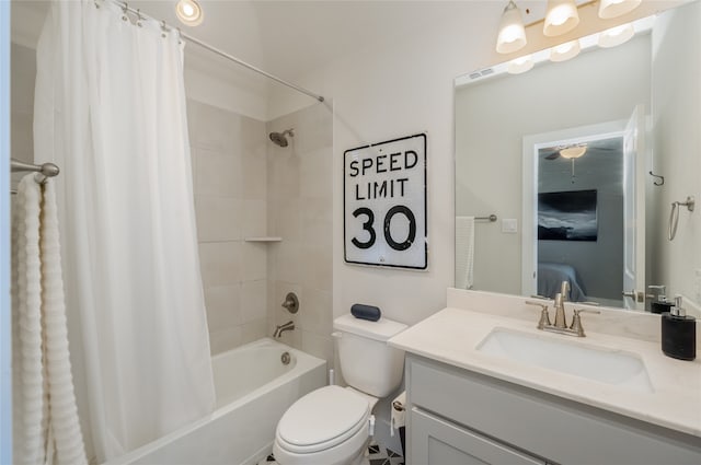 bathroom featuring toilet, vanity, and shower / bathtub combination with curtain