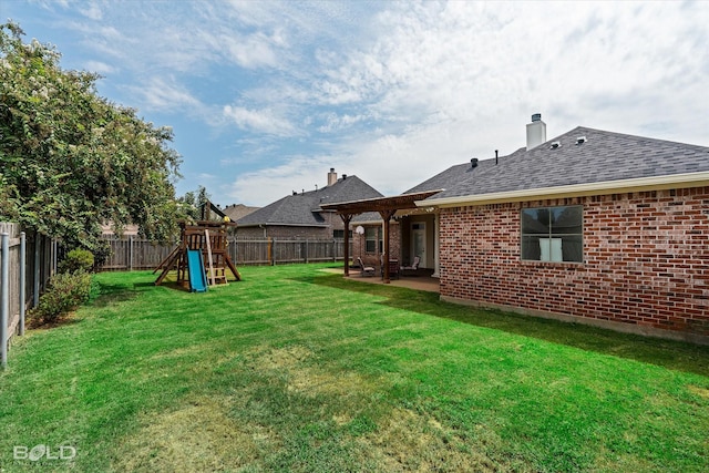 view of yard with a fenced backyard, a playground, and a patio