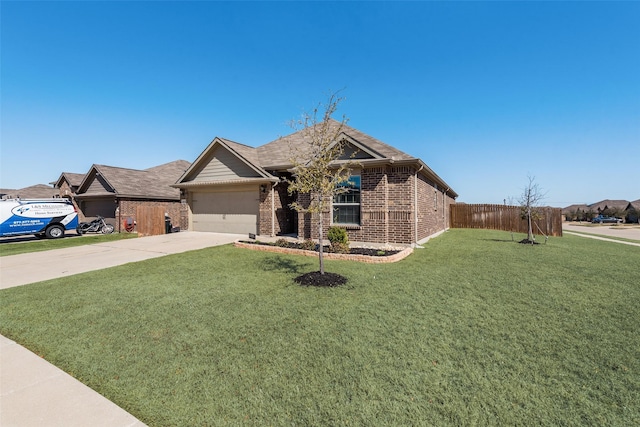 single story home featuring a front yard, fence, driveway, an attached garage, and brick siding