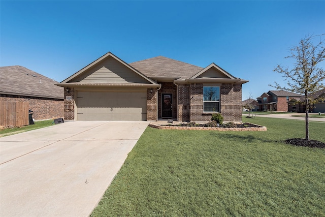 ranch-style home with brick siding, fence, a front yard, driveway, and an attached garage