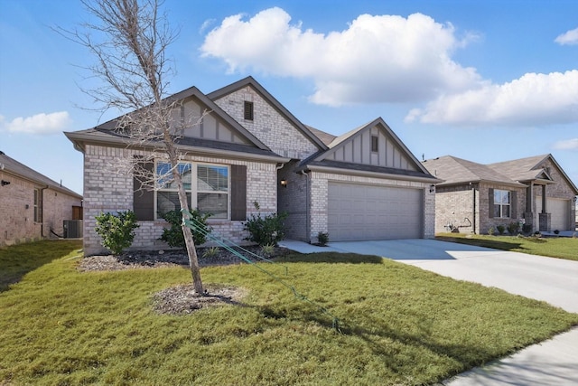 view of front of property featuring board and batten siding, a front yard, central AC unit, driveway, and an attached garage