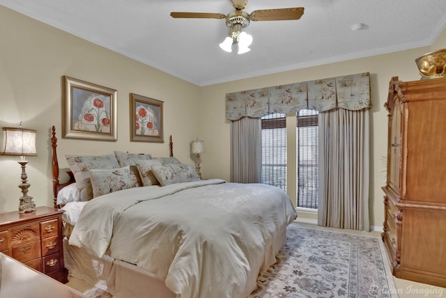 bedroom featuring baseboards, a textured ceiling, crown molding, and ceiling fan