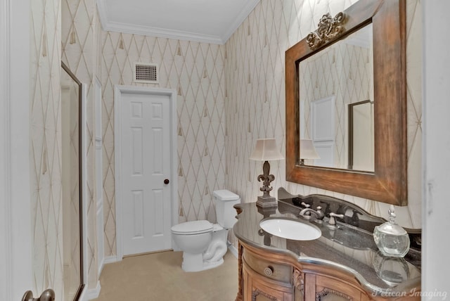 bathroom with visible vents, toilet, ornamental molding, and wallpapered walls