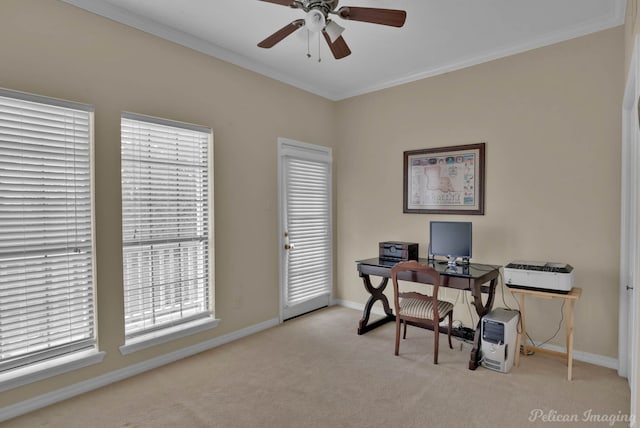 office with carpet floors, a ceiling fan, baseboards, and ornamental molding