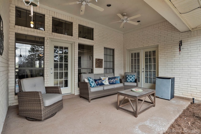 view of patio / terrace featuring a ceiling fan and french doors