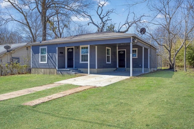 view of front of house featuring a front yard and driveway