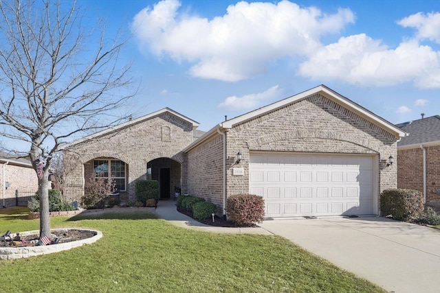 view of front of property featuring a front lawn, an attached garage, brick siding, and driveway