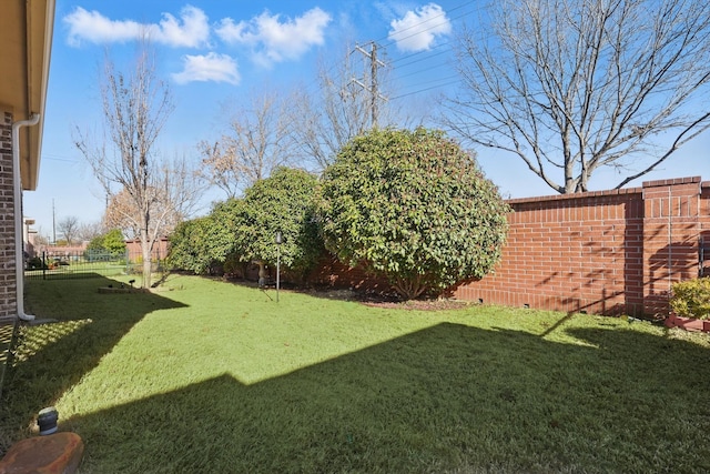 view of yard with fence