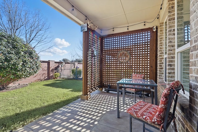 view of patio with fence