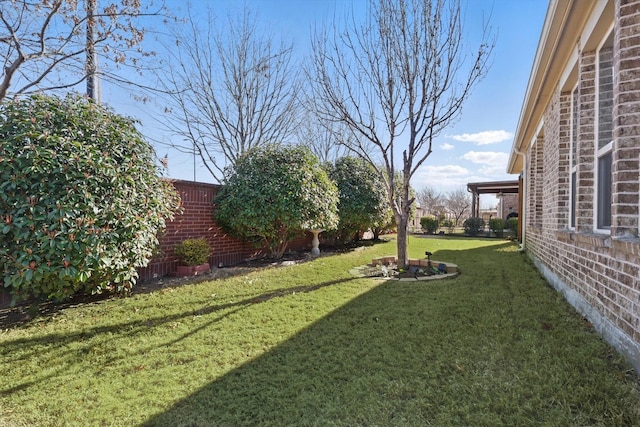 view of yard with fence