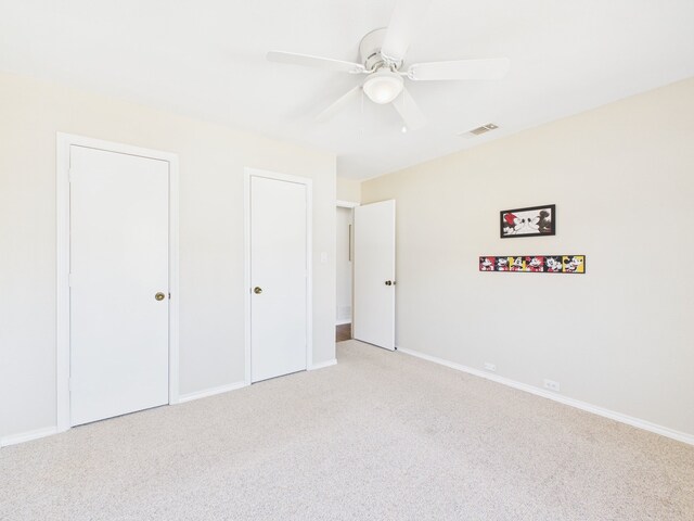 full bathroom with shower / bath combination with curtain, toilet, and tile patterned floors