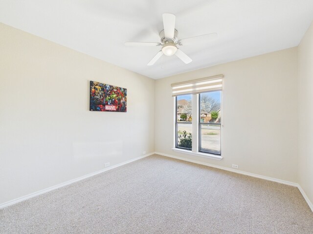 unfurnished room featuring visible vents, lofted ceiling with beams, and a wainscoted wall