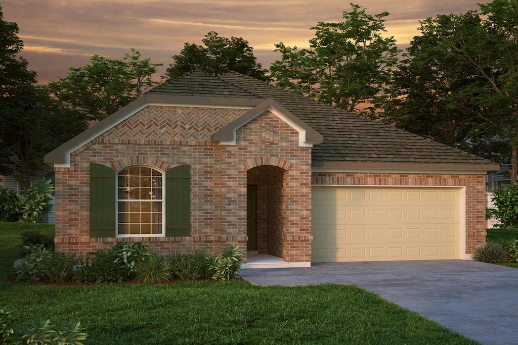 view of front of property with concrete driveway, a garage, and brick siding