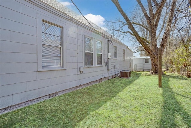 view of yard featuring central AC